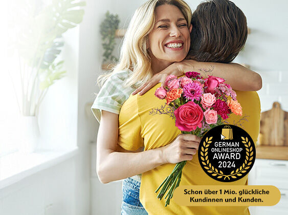 BD_Buehne_uebergabe_Mobil_563x420px Blumen-Arrangement, Erwachsener, Weiblich, Person, Frau